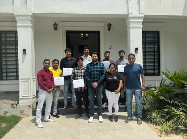 GILM student batch with certificates