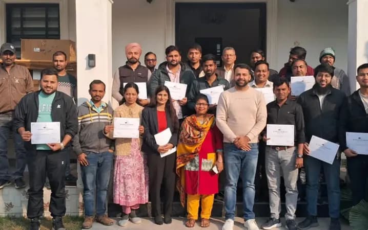GILM student batch with certificates